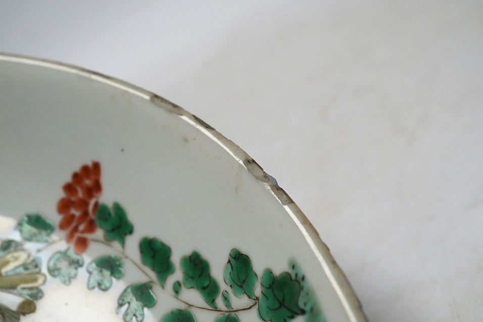 A Chinese famille verte dish, Kangxi period, 21cm. Condition - rim chips, otherwise fair